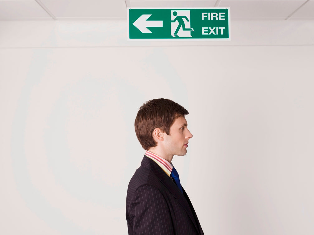 exit sign mounting height requirement 