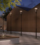 Outdoor LED area light illuminating parking lot at night