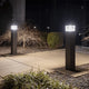 LED bollard lights installed along commercial outdoor walkway for pathway illumination